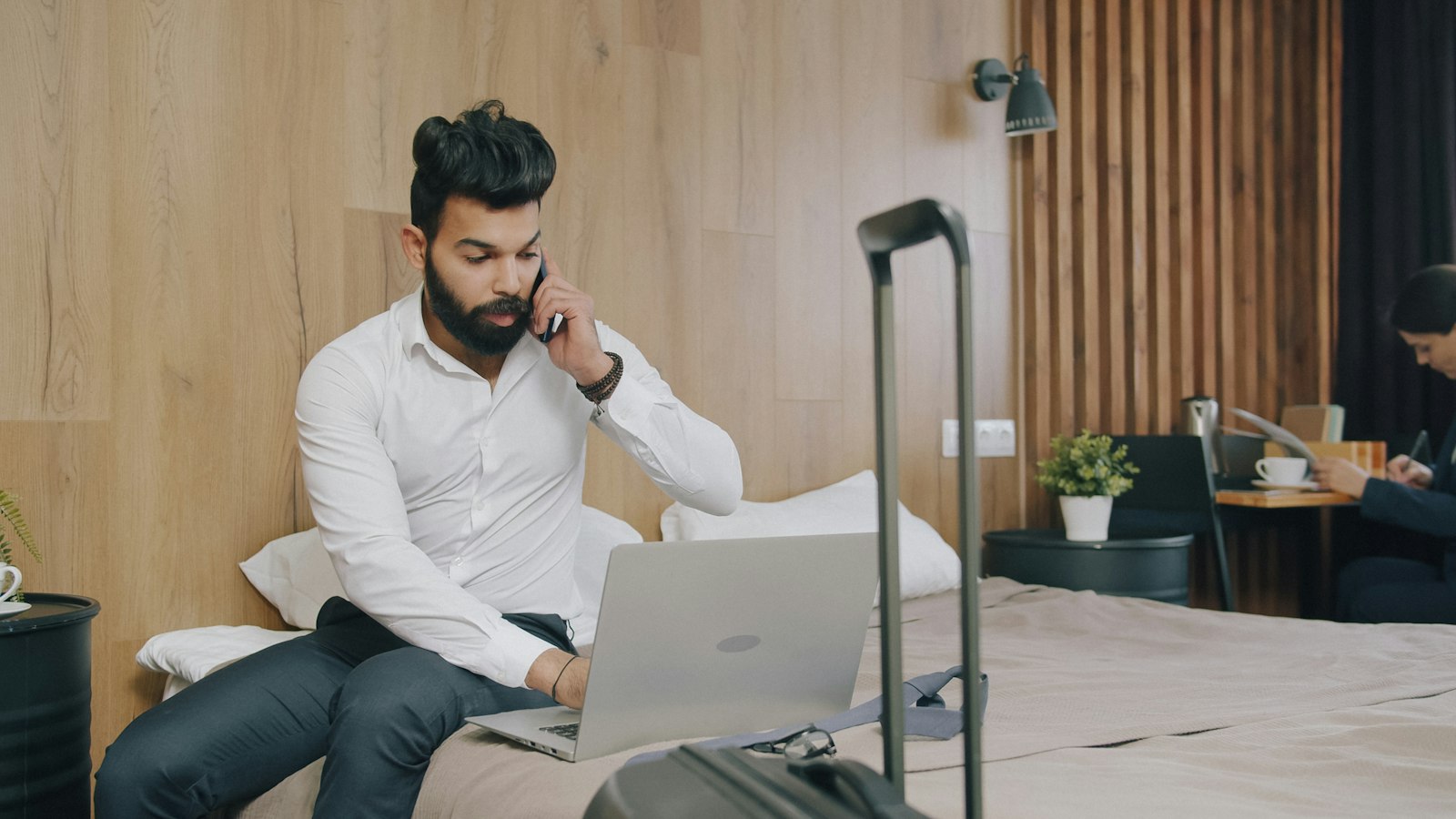 Someone handling a call in hospitality