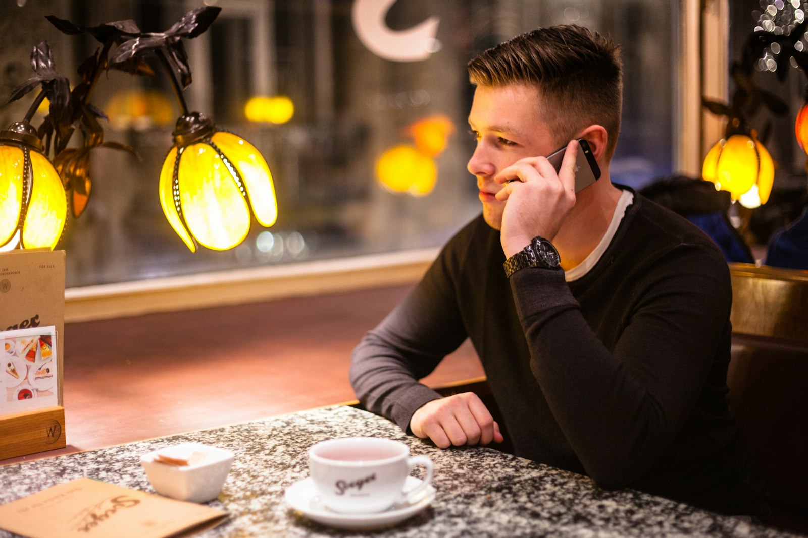 Someone handling a call in restaurants